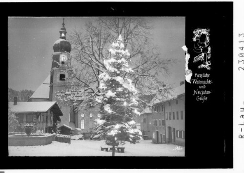 Herzliche Weihnachts- und Neujahrsgrüße : [Weihnachtsbaum mit Pfarrkirche in Vils im Ausserfern / Tirol]