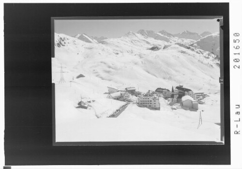 [St.Christoph am Arlberg mit Maienseelift gegen Verwallgruppe]